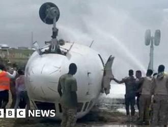 Somalia plane crash: Plane flips over at Mogadishu airport