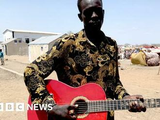 Sudan conflict: 'How I saved my red guitar from Khartoum war zone'